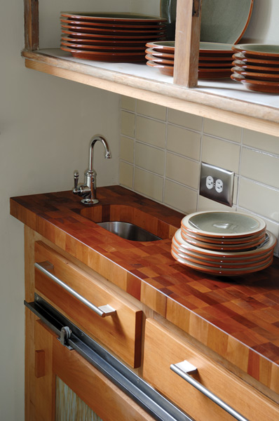 
The small pantry sink is convenient and melds well with the reclaimed Madrona countertops.
